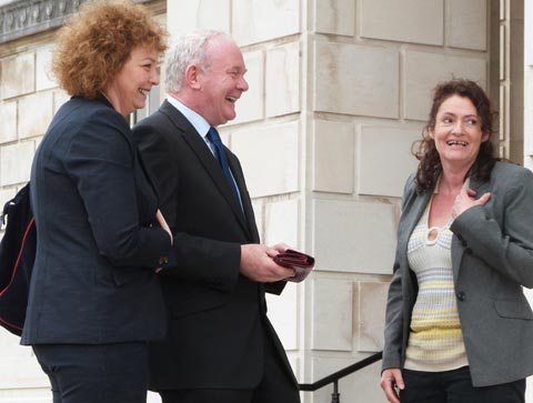 Deputy first minister Martin McGuinness receives an empty purse