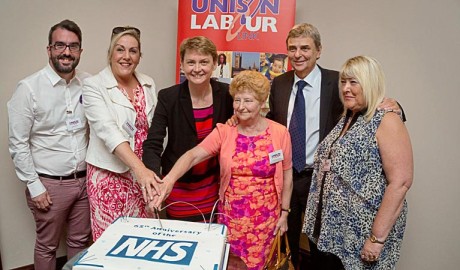 Dave Prentis, Yvette Cooper and Labour Link delegates cut a Happy 65th Birthday NHS cake