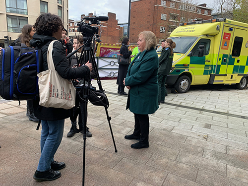 Christinas McAnea being interviewed at the Waterloo ambulance station picket today